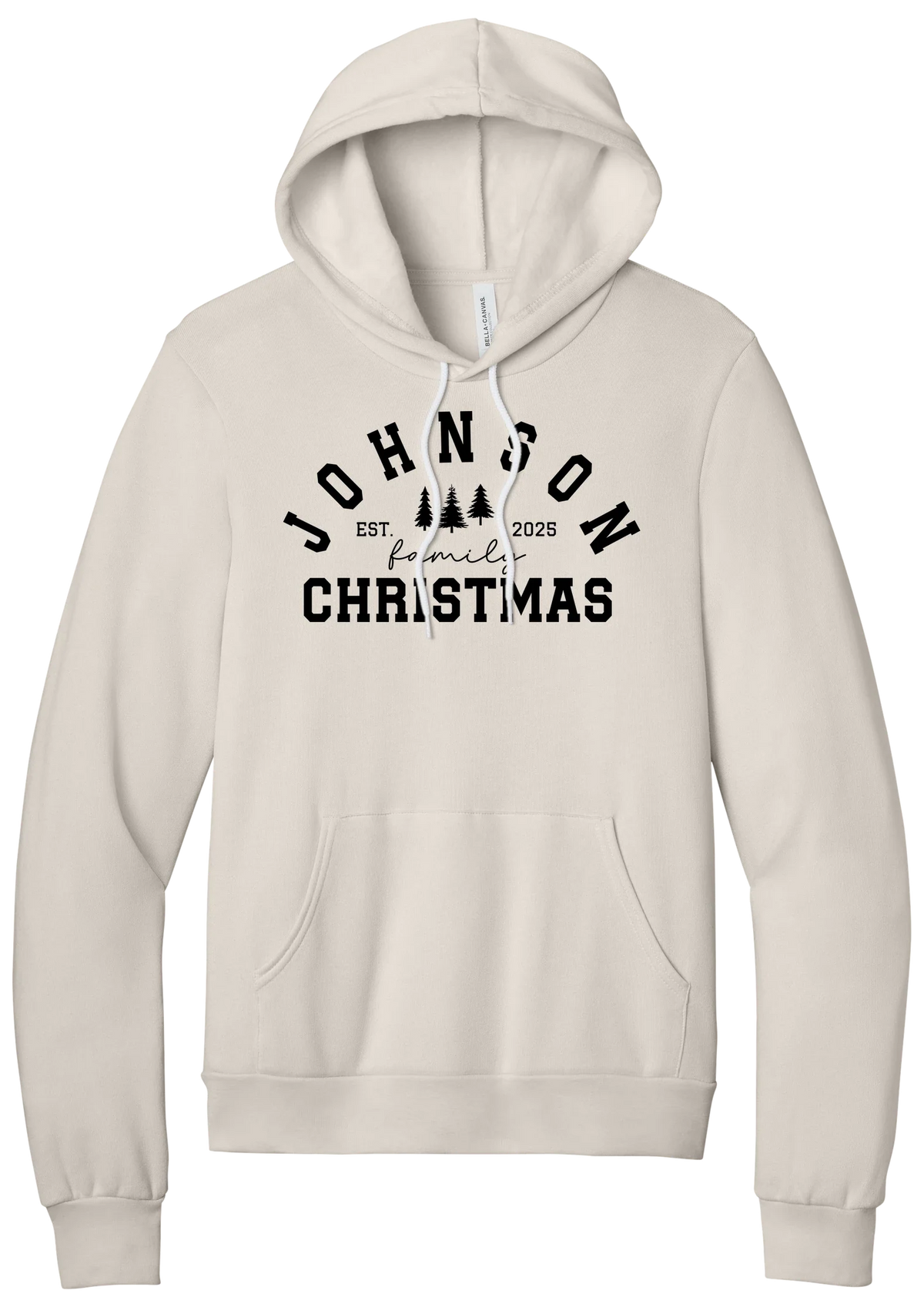 Personalized Family Christmas hoodie in Heather Dust, featuring an arched family name over pine trees with EST. year and family Christmas lettering