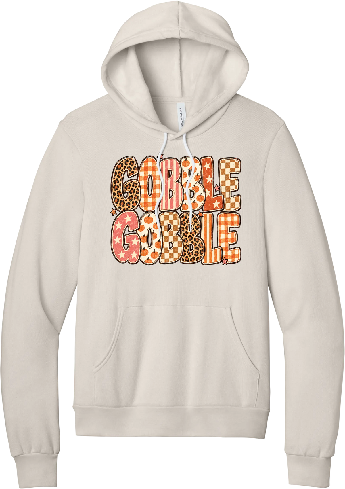 Gobble Gobble Patchwork hoodie in Heather Dust, featuring Gobble Gobble in bubble letters filled with leopard, gingham, checkerboard, stars, and pumpkin prints