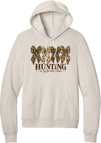 Hunting Is My Favorite Season hoodie in Heather Dust, featuring four camo coquette bows with antlers, acorns, and deer above Hunting Is My Favorite Season lettering