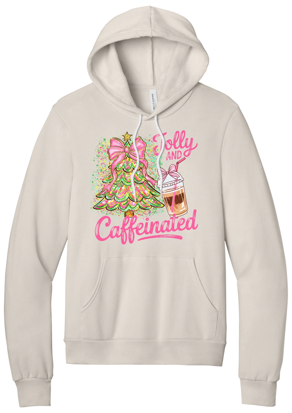 Jolly and Caffeinated hoodie in Heather Dust, featuring a pink bow Christmas tree and an iced coffee with Jolly and Caffeinated script