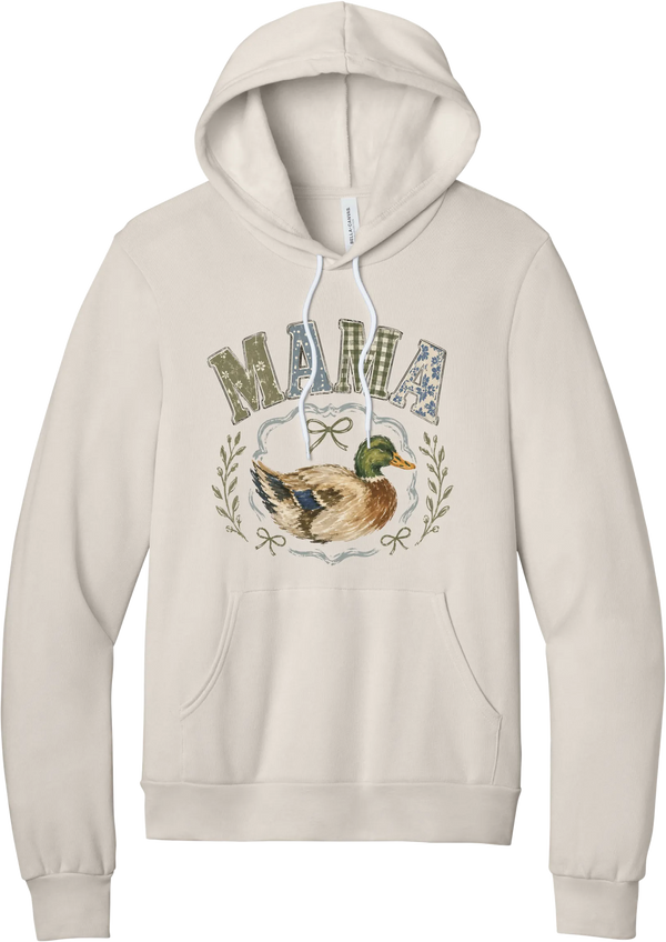 Mallard Mama hoodie in Heather Dust, featuring MAMA in gingham and floral patchwork letters above a painted mallard duck framed by ribbons and laurels