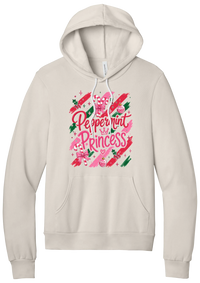 Peppermint Princess hoodie in Heather Dust, featuring pink Peppermint Princess script with candy canes, a crown, and bows on red and green brush strokes