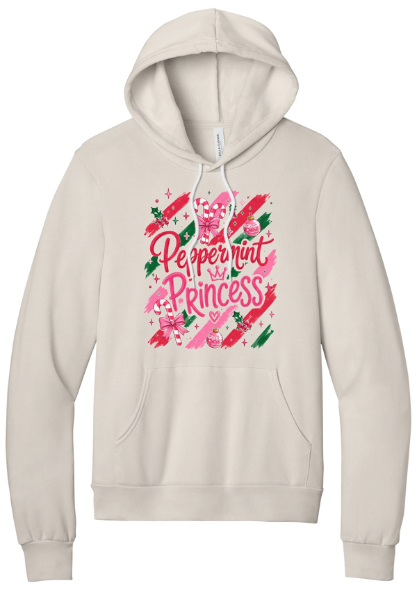 Peppermint Princess hoodie in Heather Dust, featuring pink Peppermint Princess script with candy canes, a crown, and bows on red and green brush strokes