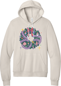 Retro Wreath hoodie in Heather Dust, featuring a retro tinsel Christmas wreath with vintage ornaments and a red bow