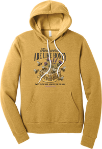 Words Like Honey hoodie in Heather Mustard, featuring Kind Words Are Like Honey lettering over a dripping honeycomb with bees, wildflowers, and Proverbs 16:24