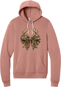 Coquette Antlers hoodie in Mauve, featuring deer antlers tied with an oversized camo bow, twine, and autumn leaves
