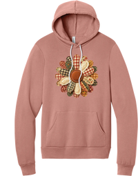 Patchwork Fabric Flower hoodie in Mauve, featuring an oversized fabric flower with plaid, gingham, calico, and cable knit petals around a stitched rust center