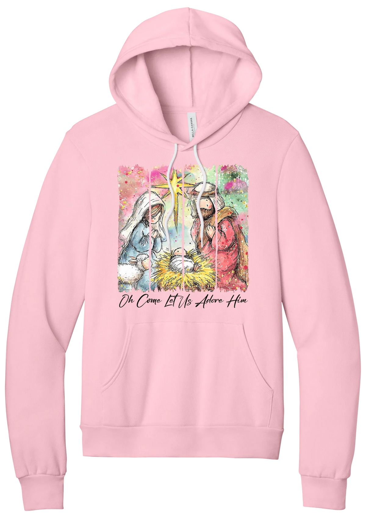 Adore Him Painted Nativity hoodie in Pink, featuring a watercolor nativity of Mary, Joseph, and baby Jesus under a star with Oh Come Let Us Adore Him script