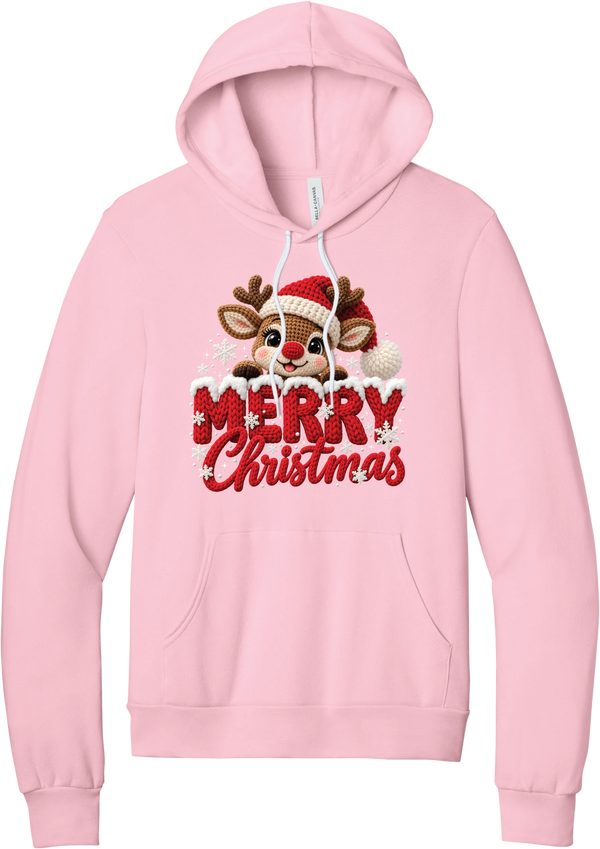 Crocheted Rudolph Merry Christmas hoodie in Pink, featuring a crochet-style reindeer in a Santa hat peeking over knit-texture Merry Christmas lettering with snowflakes
