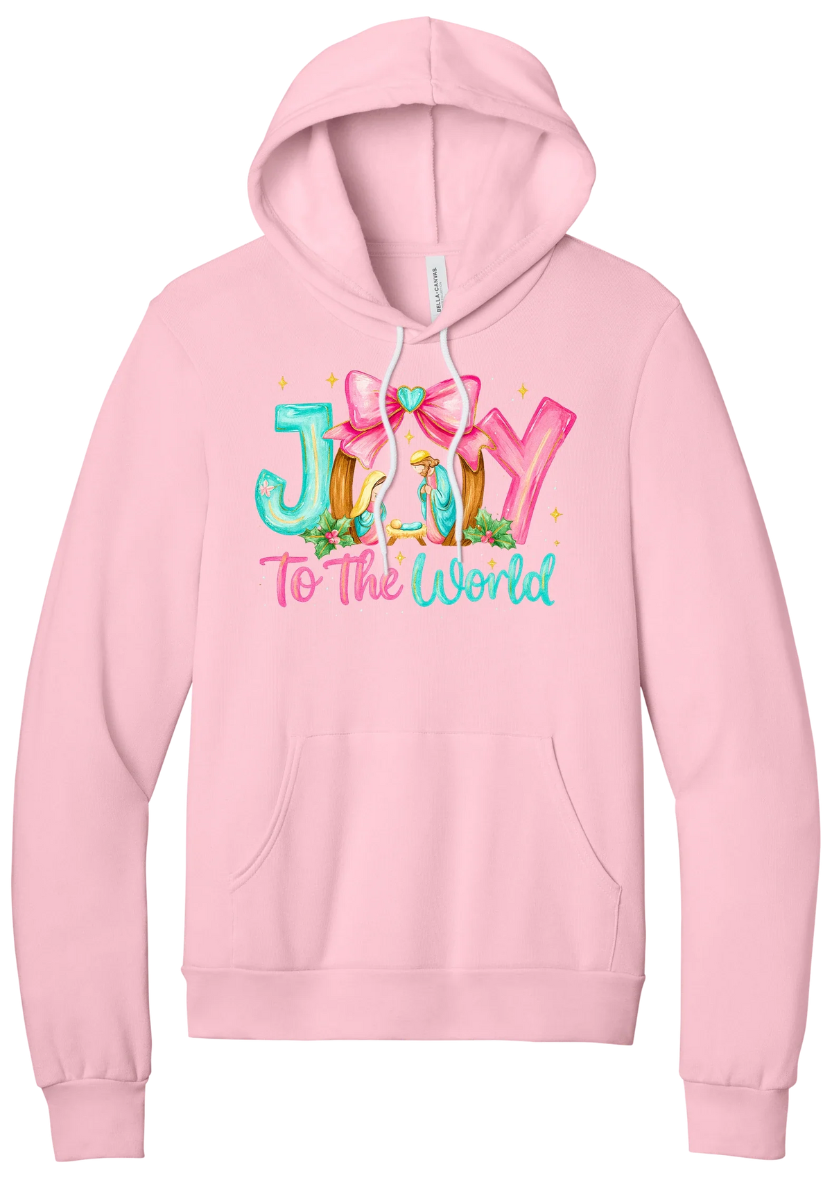 Joy to the World Nativity hoodie in Pink, featuring painted JOY letters framing a nativity scene with a pink bow and To The World script