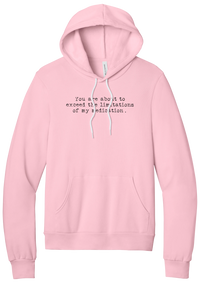 Limitations of My Medication hoodie in Pink, featuring You are about to exceed the limitations of my medication in distressed black typewriter letters