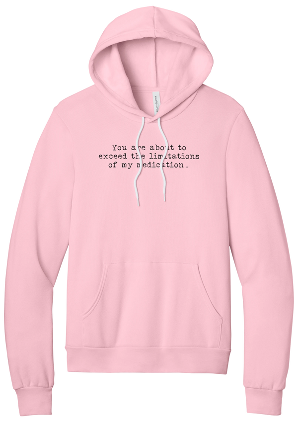 Limitations of My Medication hoodie in Pink, featuring You are about to exceed the limitations of my medication in distressed black typewriter letters