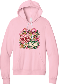 Merry and Bright Ornaments hoodie in Pink, featuring hand-painted pink and green ornaments reading Merry and Bright with a pink bow, holly, daisies, a candy cane, and a gingerbread man