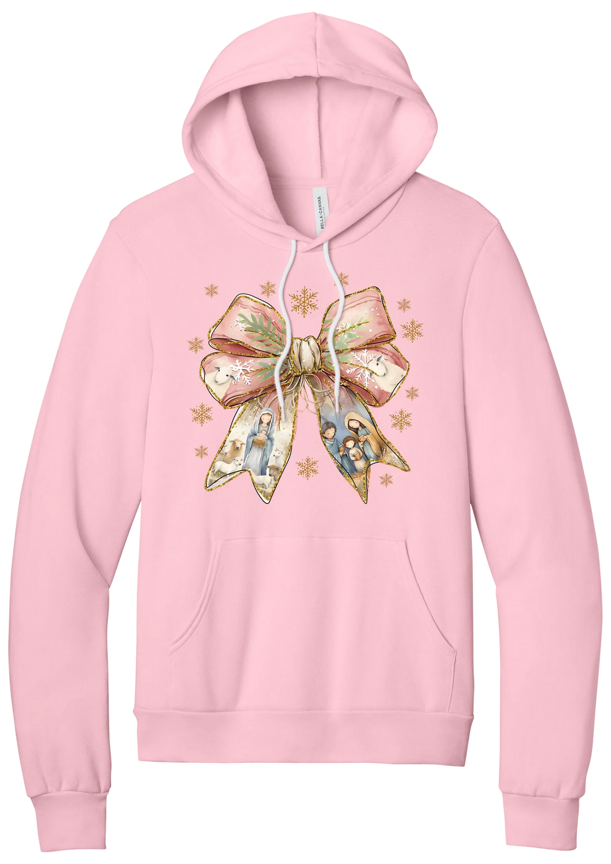 Nativity Bow hoodie in Pink, featuring a blush satin bow with painted nativity scenes in its ribbons and gold snowflakes