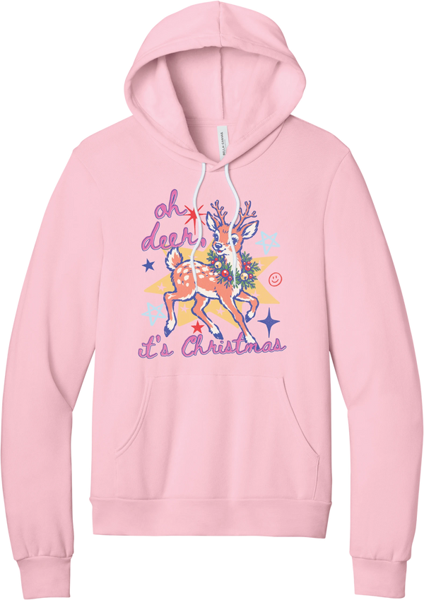 Oh Deer Retro hoodie in Pink, featuring a retro spotted fawn with a holly wreath, pastel stars, and Oh Deer It's Christmas script