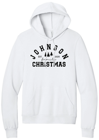 Personalized Family Christmas hoodie in White, featuring an arched family name over pine trees with EST. year and family Christmas lettering