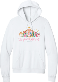 The Greatest Gift of All hoodie in White, featuring a pastel watercolor nativity scene under the star with The Greatest Gift of All script and Matthew 1:21