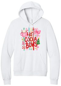 Hot Cocoa and Bows hoodie in White, featuring red HOT COCOA and BOWS letters on pastel stripes with a cocoa mug and a pink bow
