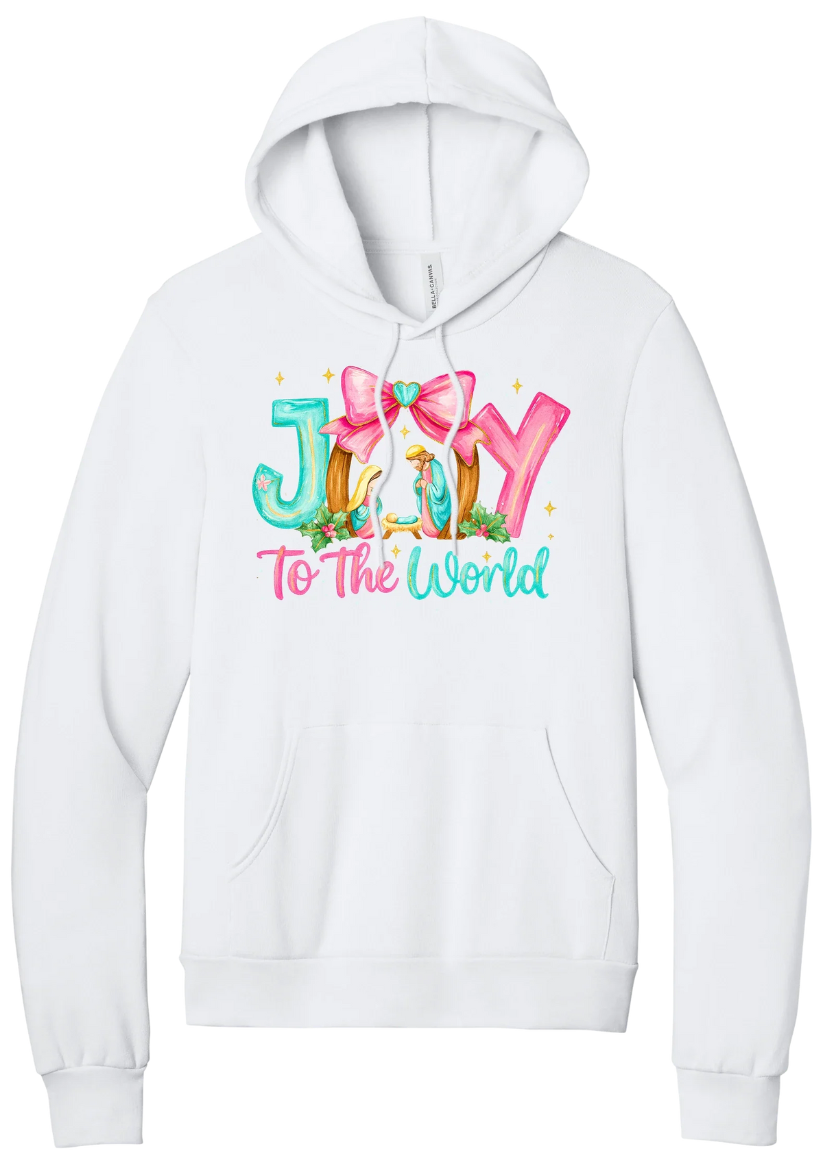 Joy to the World Nativity hoodie in White, featuring painted JOY letters framing a nativity scene with a pink bow and To The World script