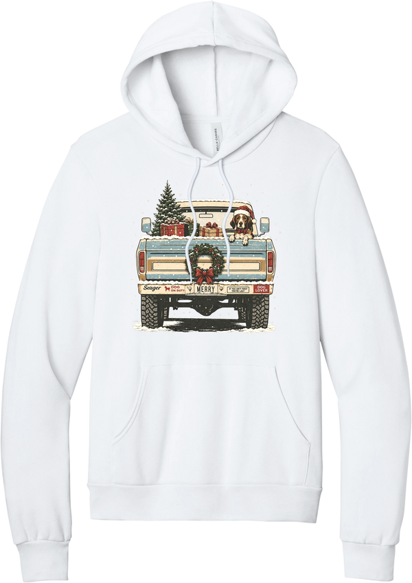 Christmas Pickup Truck with Dog hoodie in White, featuring a vintage pickup truck with a Christmas tree, wrapped gifts, a tailgate wreath, and a dog in a Santa hat