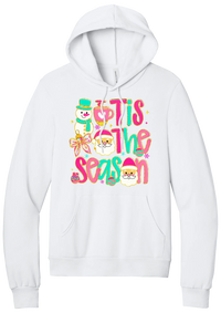 Tis the Season Snowman hoodie in White, featuring pink and teal TIS THE SEASON letters with a snowman, a cocoa mug, and Santas