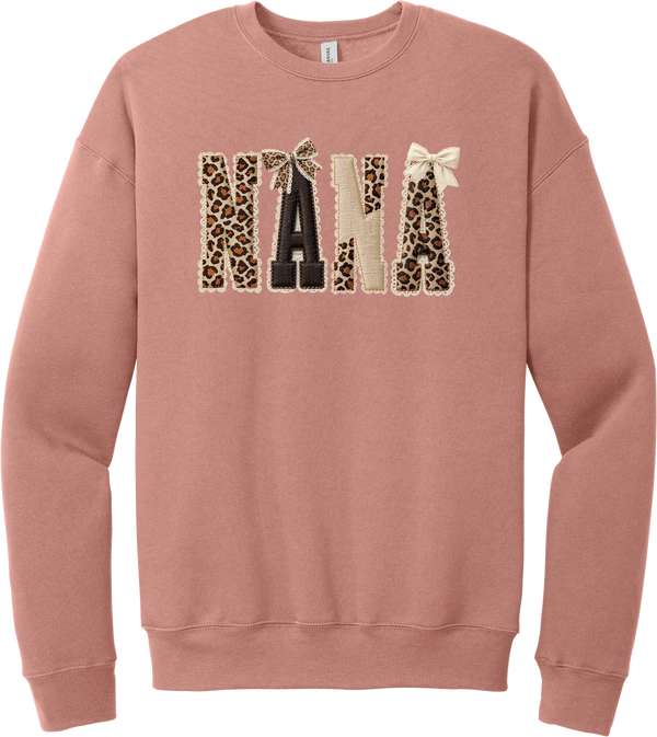 Grandma Leopard Applique crewneck sweatshirt in Mauve, featuring NANA spelled out in leopard, cream, and chocolate patches with a scalloped stitched applique look and two bows