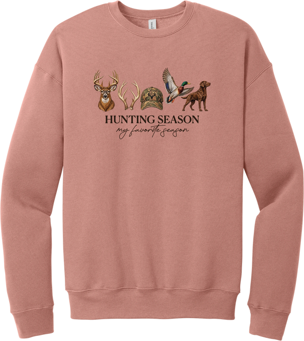 Hunting Season crewneck sweatshirt in Mauve, featuring a whitetail buck, antlers, a camo cap, a flying mallard, and a chocolate lab above Hunting Season My Favorite Season lettering