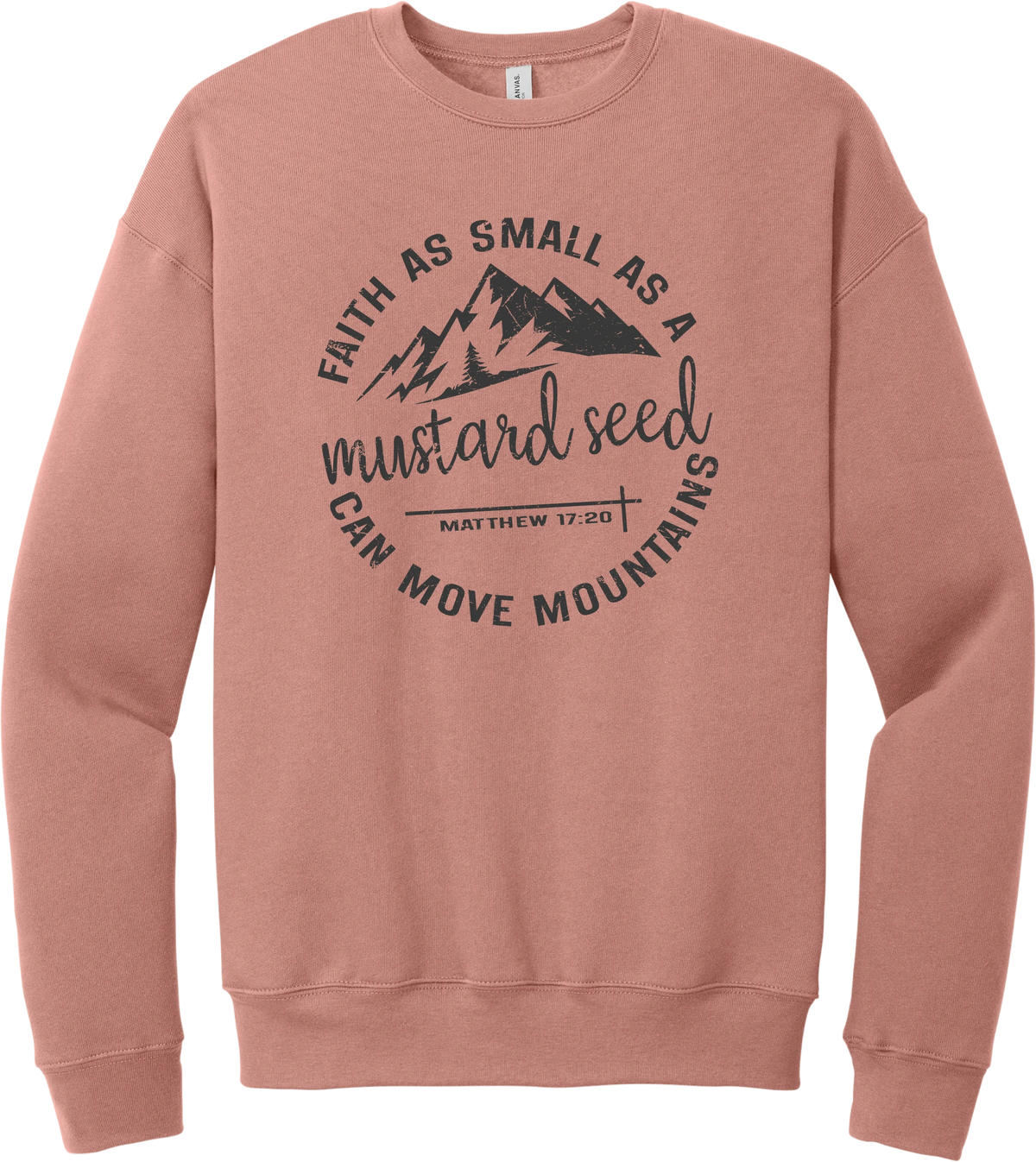 Mustard Seed Faith crewneck sweatshirt in Mauve, featuring a circle badge of mountains and a cross with Faith as Small as a Mustard Seed Can Move Mountains lettering and Matthew 17:20