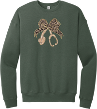Leopard Bow Stethoscope crewneck sweatshirt in Military Green, featuring a glittery leopard print coquette bow tied to a rose gold stethoscope