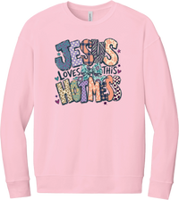Jesus Loves This Hot Mess crewneck sweatshirt in Pink, featuring patchwork Jesus Loves This Hot Mess lettering in leopard, plaid, polka dot, and zebra prints with a bow and hearts