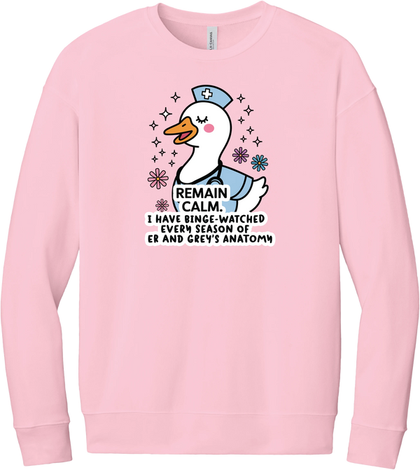 Remain Calm Nurse crewneck sweatshirt in Pink, featuring a nurse goose in a cap with sparkles and flowers above Remain Calm lettering