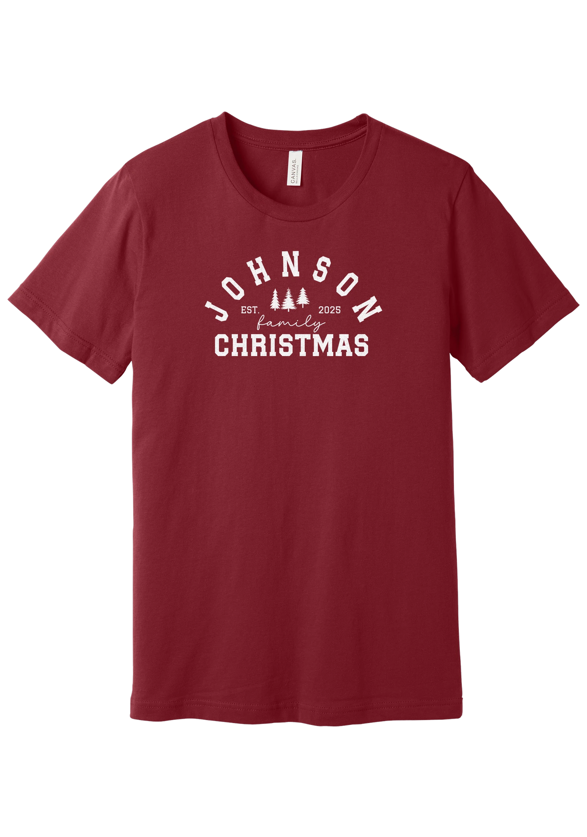 Personalized Family Christmas tee in Cardinal, featuring a personalized family last name arched over three pine trees with EST. and the year