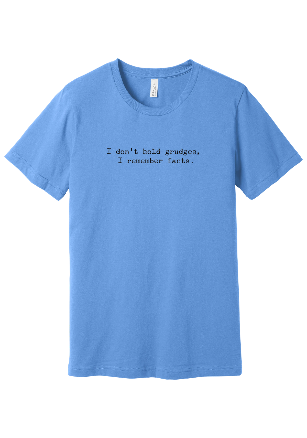 I Don't Hold Grudges tee in Carolina Blue, featuring I don't hold grudges, I remember facts in distressed black typewriter letters