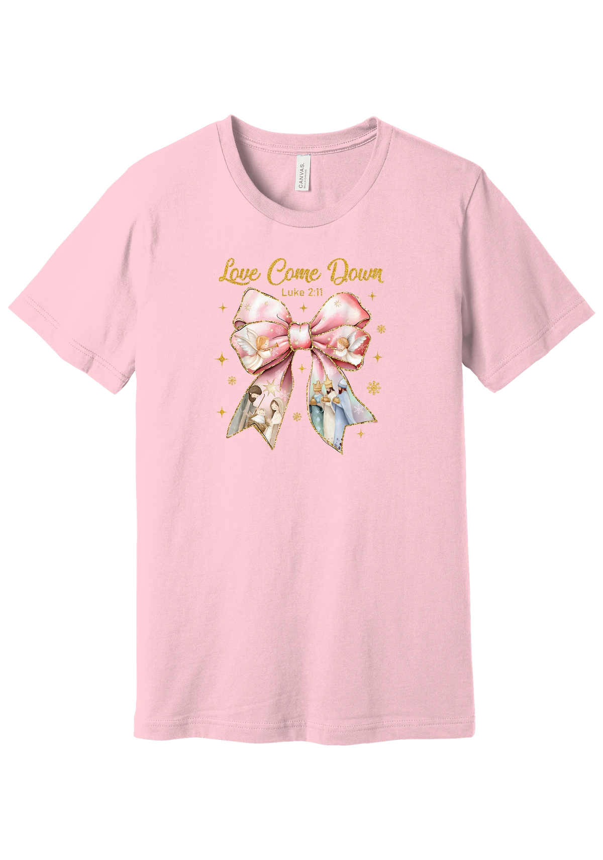 Love Came Down Nativity Bow tee in Pink, featuring a blush satin bow with painted nativity scenes under gold Love Came Down script and Luke 2:11