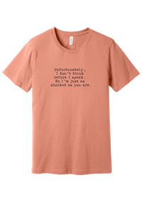 Just as Shocked as You Are tee in Sunset, featuring Unfortunately, I don't think before I speak. So I'm just as shocked as you are in distressed black typewriter letters