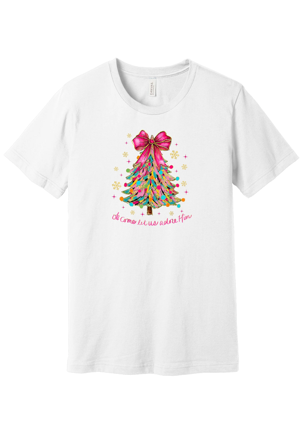 Adore Him Ribbon Tree tee in White, featuring a colorful ribbon Christmas tree topped with a hot pink bow over Oh Come Let Us Adore Him script