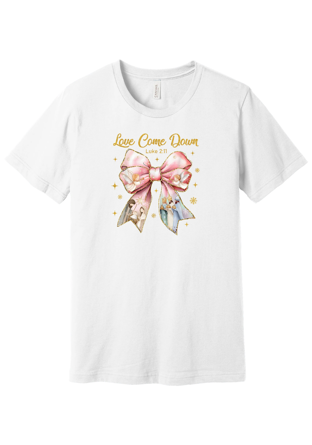 Love Came Down Nativity Bow tee in White, featuring a blush satin bow with painted nativity scenes under gold Love Came Down script and Luke 2:11