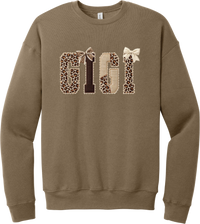 Grandma Leopard Applique crewneck sweatshirt in Vintage Brown, featuring GIGI spelled out in leopard, cream, and chocolate patches with a scalloped stitched applique look and two bows