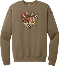 For the Love of Football crewneck sweatshirt in Vintage Brown, featuring a patchwork heart in leopard, plaid, and checkerboard with a football and a cream bow
