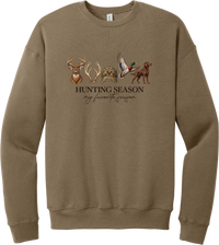 Hunting Season crewneck sweatshirt in Vintage Brown, featuring a whitetail buck, antlers, a camo cap, a flying mallard, and a chocolate lab above Hunting Season My Favorite Season lettering